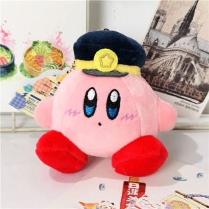 Różowy pluszowy Kirby, siedzący z marynarskim kepi