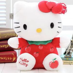 Uroczy pluszowy Hello Kitty z czerwonym motylem siedzącym przed książkami
